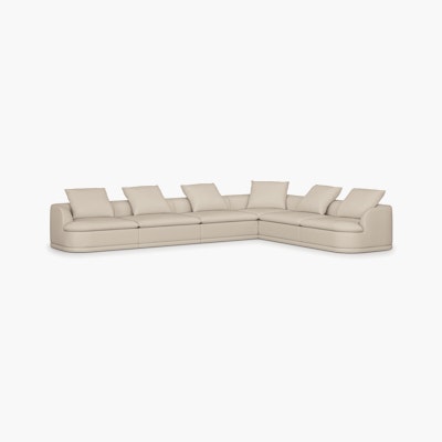 A Atlason Composed Modular Sofa Rectilinear Corner Sectional in Cream viewed from an angle.