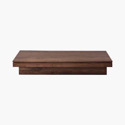 Pawson Drift Coffee Table with walnut base and top, viewed from the front.